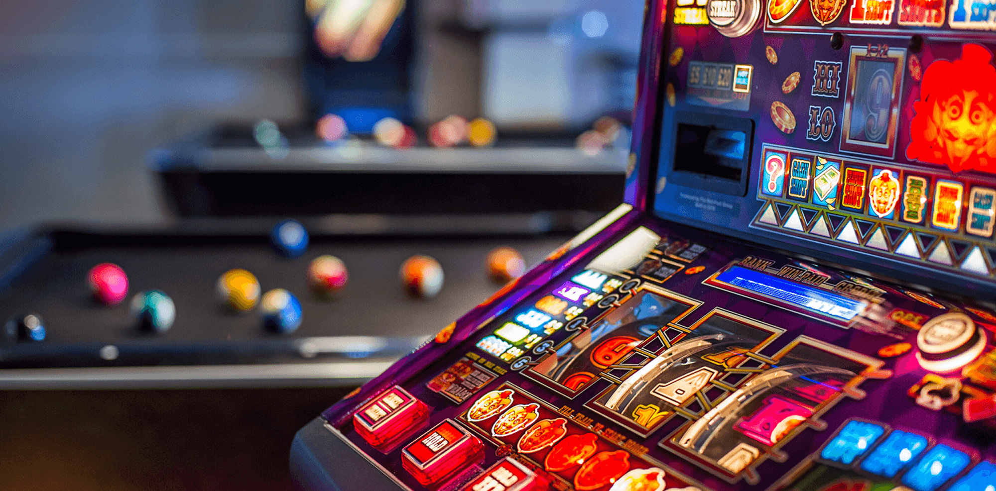 Fruit machine with Pool table in the background