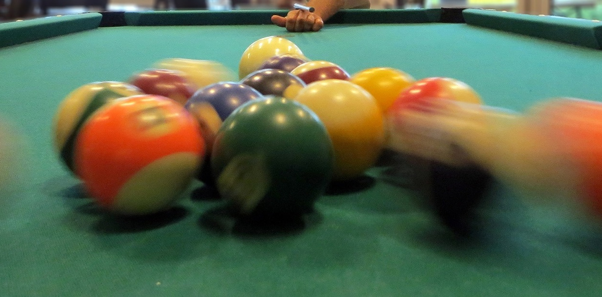 Close up of pool table break
